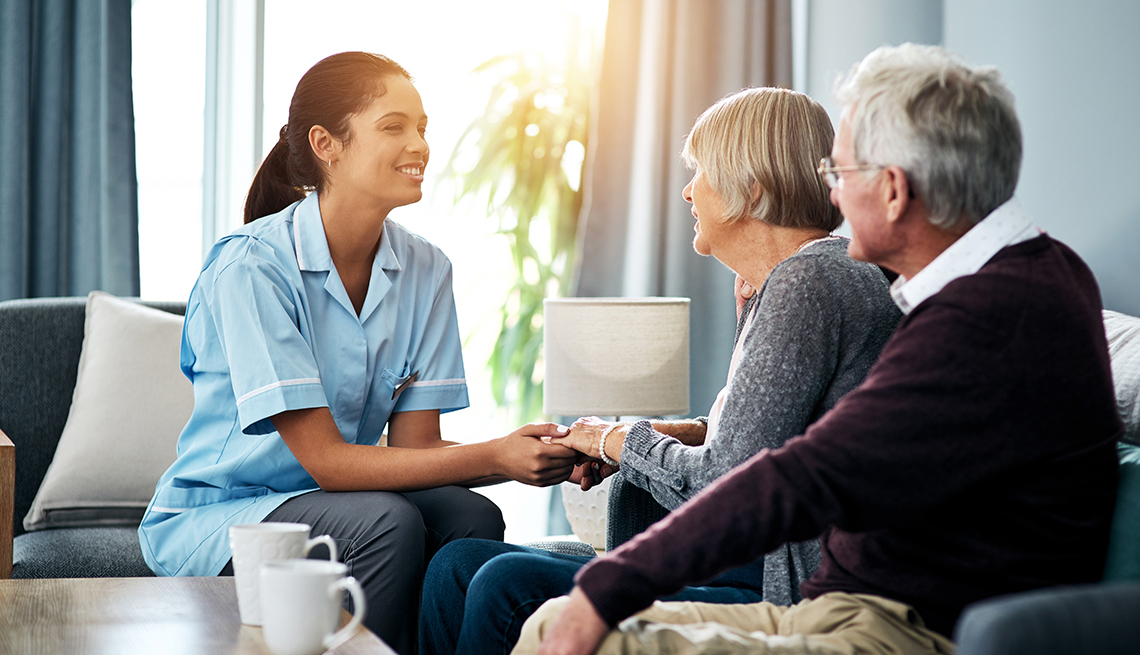 Nurse helping care for couple